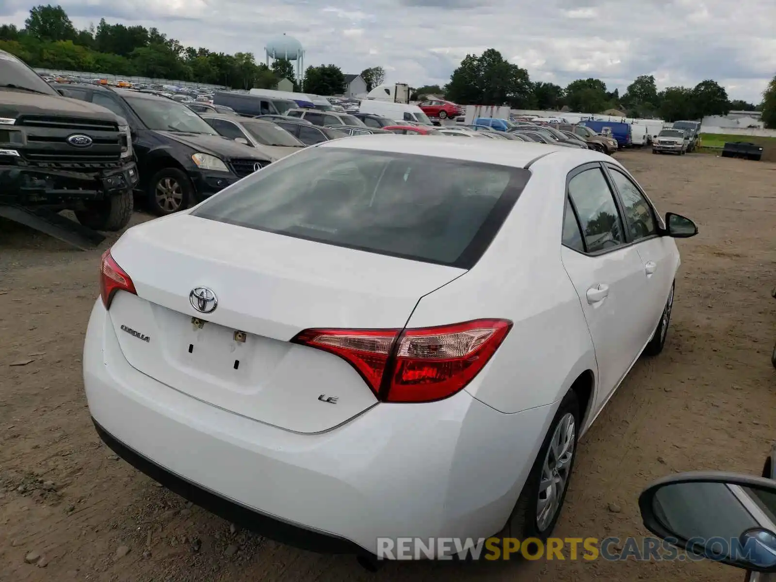 4 Photograph of a damaged car 5YFBURHE5KP899240 TOYOTA COROLLA 2019