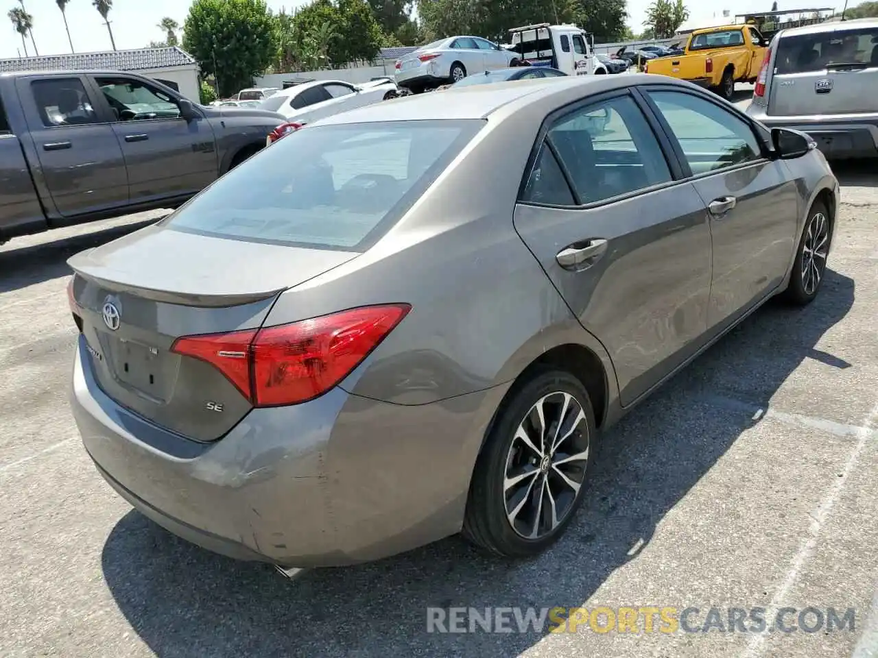 4 Photograph of a damaged car 5YFBURHE5KP909023 TOYOTA COROLLA 2019