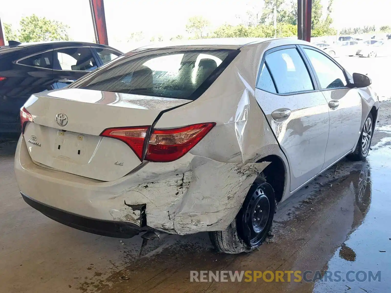 4 Photograph of a damaged car 5YFBURHE5KP911886 TOYOTA COROLLA 2019