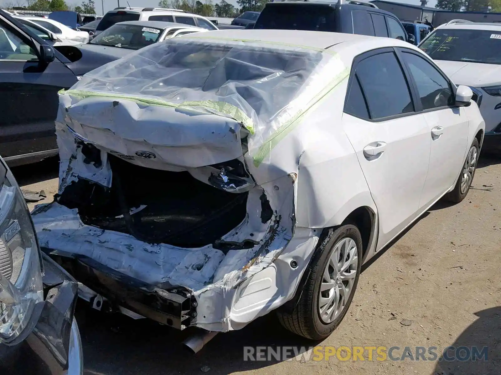 4 Photograph of a damaged car 5YFBURHE5KP913489 TOYOTA COROLLA 2019