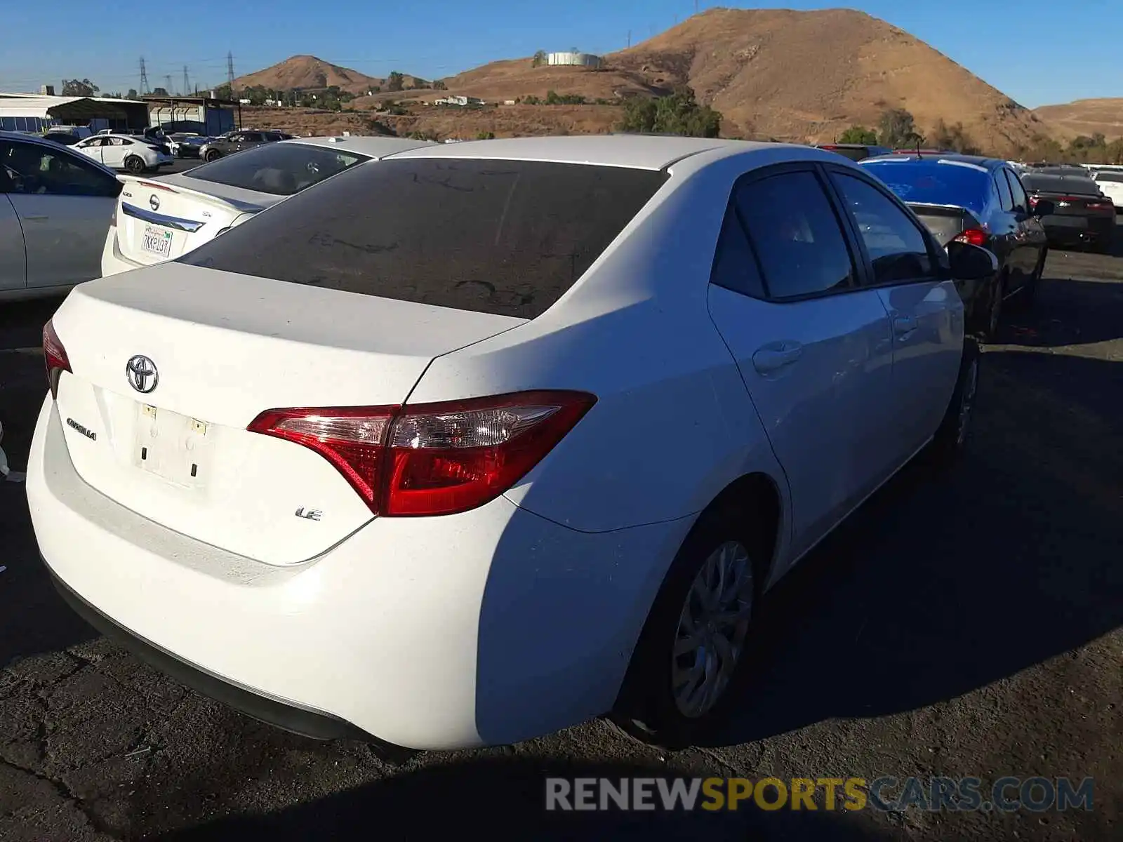 4 Photograph of a damaged car 5YFBURHE5KP915310 TOYOTA COROLLA 2019