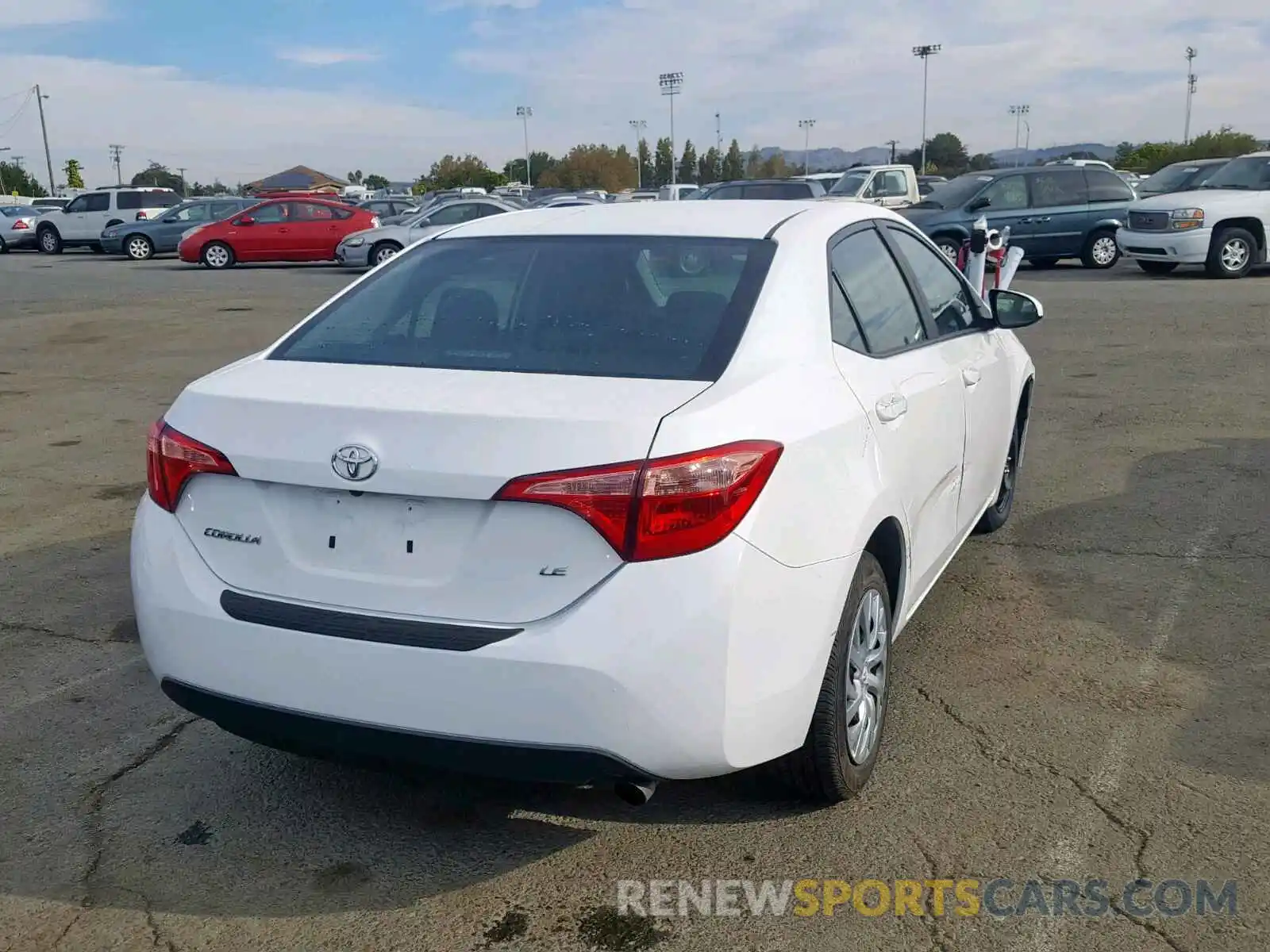 4 Photograph of a damaged car 5YFBURHE5KP916621 TOYOTA COROLLA 2019