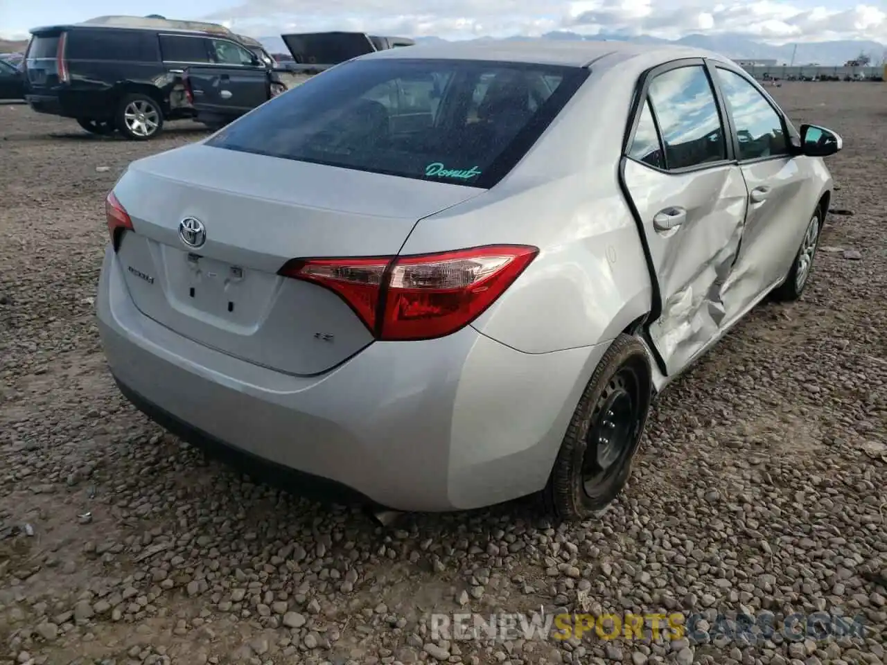 4 Photograph of a damaged car 5YFBURHE5KP938411 TOYOTA COROLLA 2019