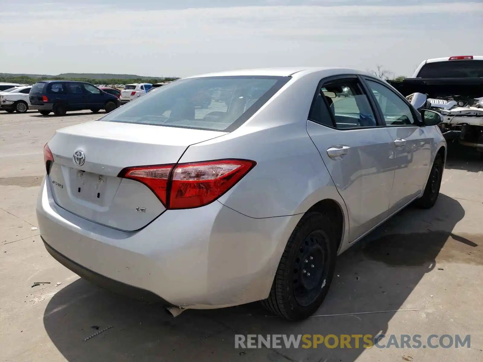 4 Photograph of a damaged car 5YFBURHE5KP939882 TOYOTA COROLLA 2019