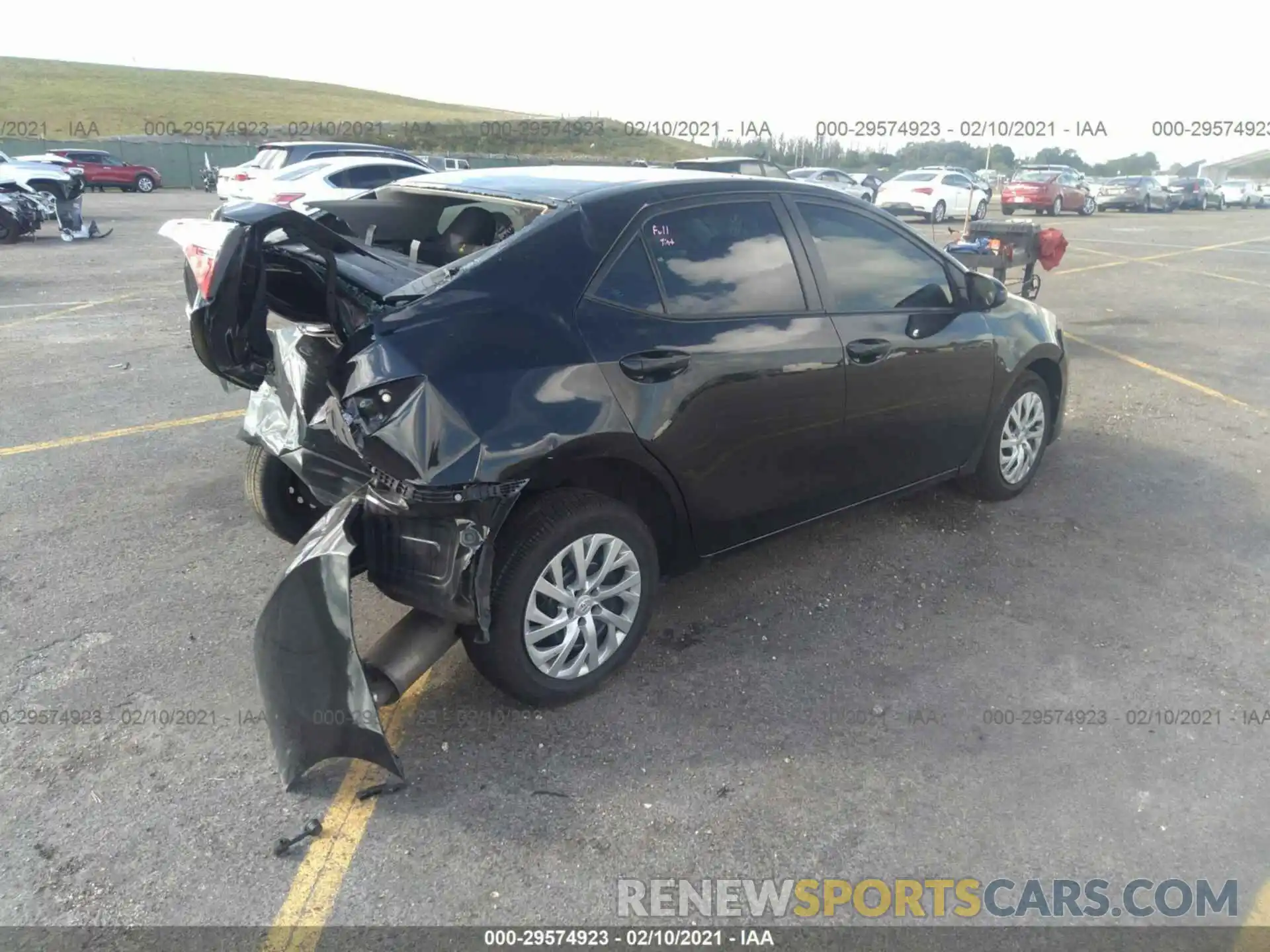 4 Photograph of a damaged car 5YFBURHE5KP943995 TOYOTA COROLLA 2019