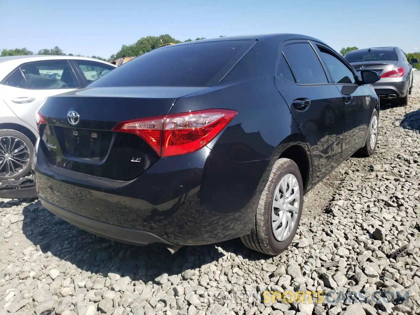 4 Photograph of a damaged car 5YFBURHE5KP944676 TOYOTA COROLLA 2019