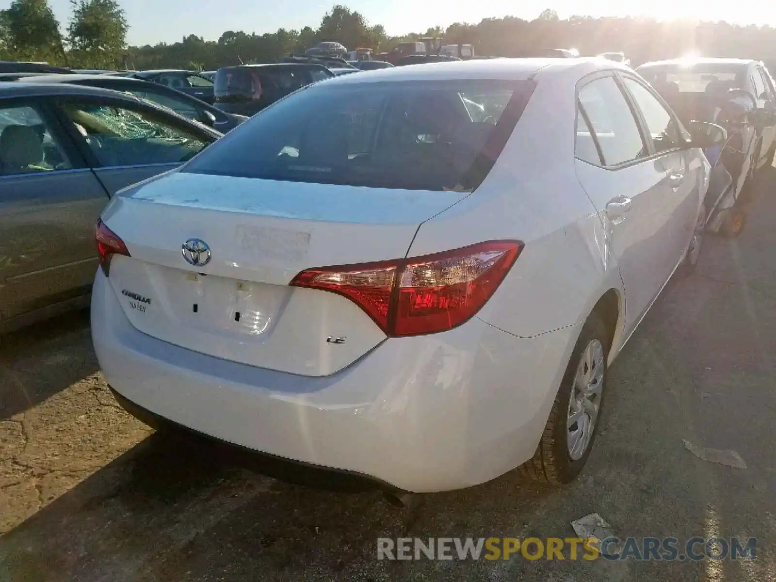 4 Photograph of a damaged car 5YFBURHE6KP860916 TOYOTA COROLLA 2019