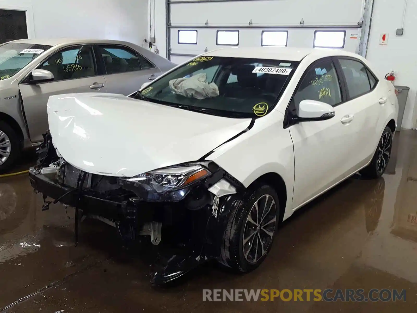 2 Photograph of a damaged car 5YFBURHE6KP864058 TOYOTA COROLLA 2019