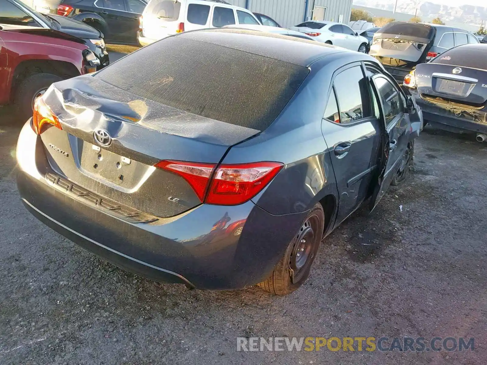 4 Photograph of a damaged car 5YFBURHE6KP879403 TOYOTA COROLLA 2019