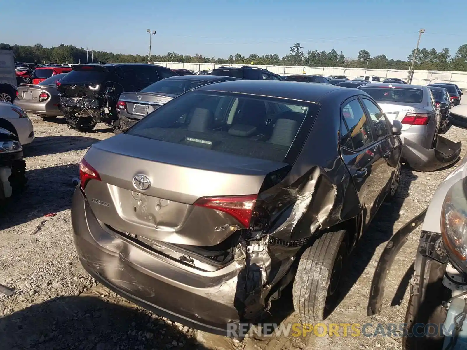 4 Photograph of a damaged car 5YFBURHE6KP887243 TOYOTA COROLLA 2019