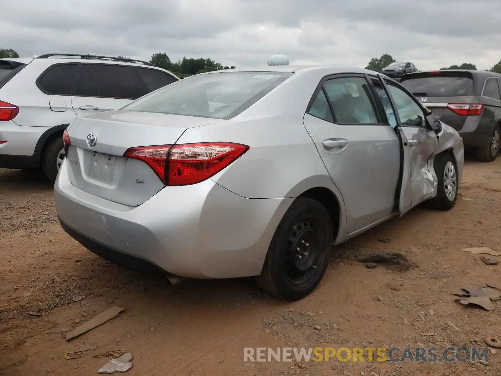 4 Photograph of a damaged car 5YFBURHE6KP899943 TOYOTA COROLLA 2019