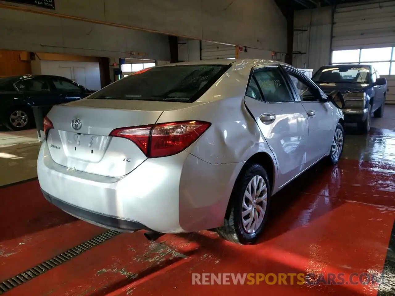 4 Photograph of a damaged car 5YFBURHE7KP900940 TOYOTA COROLLA 2019