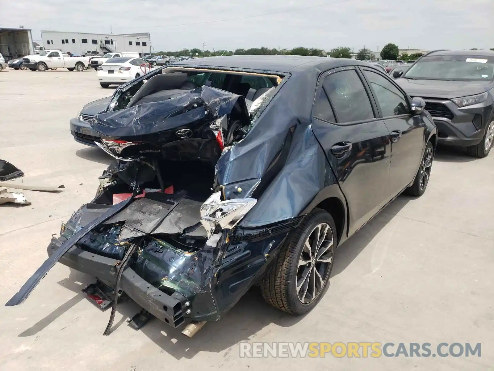 4 Photograph of a damaged car 5YFBURHE7KP936000 TOYOTA COROLLA 2019