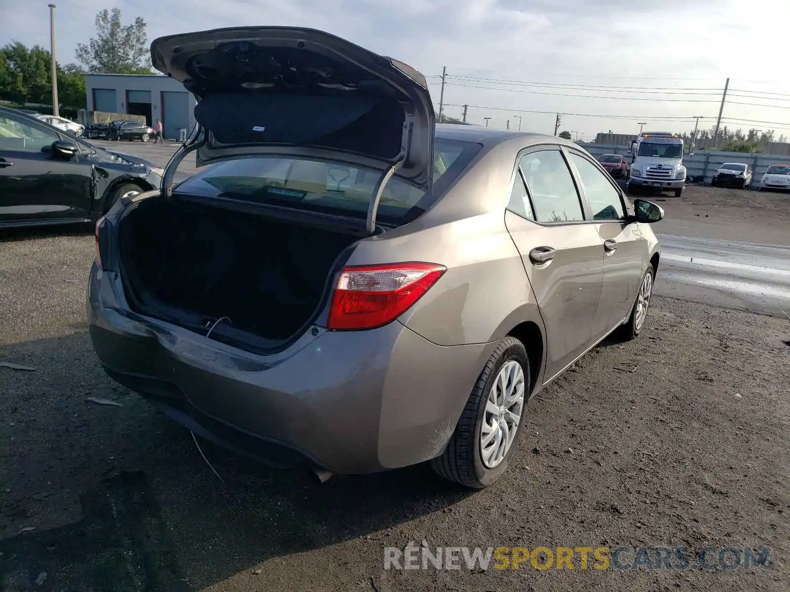 4 Photograph of a damaged car 5YFBURHE8KP858049 TOYOTA COROLLA 2019