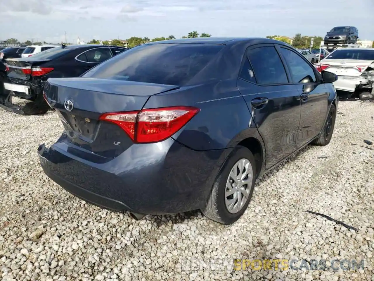 4 Photograph of a damaged car 5YFBURHE8KP869620 TOYOTA COROLLA 2019