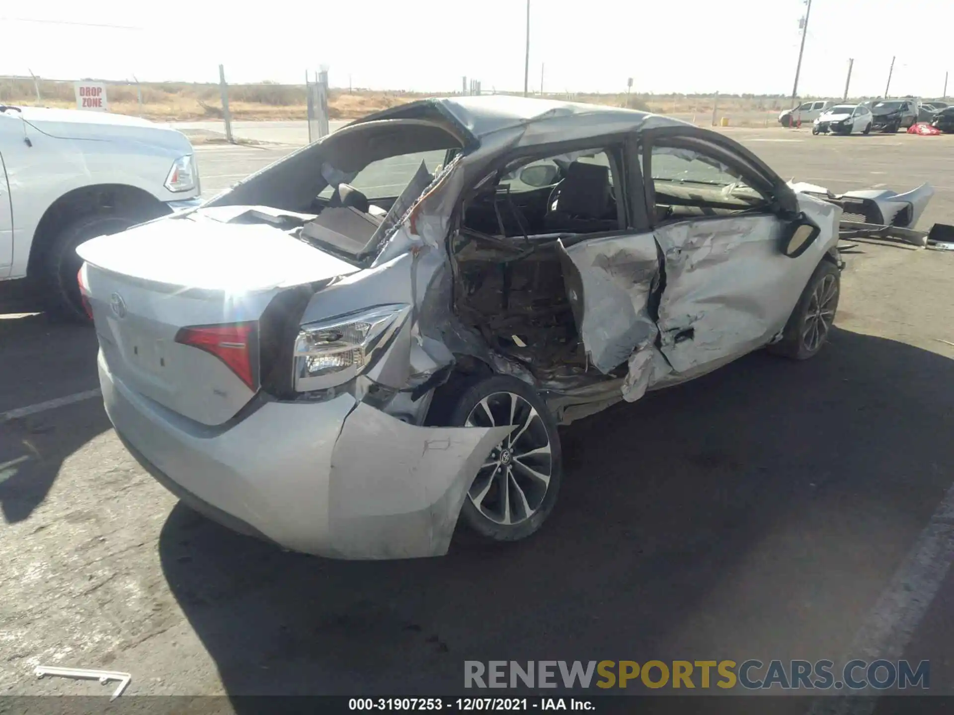 4 Photograph of a damaged car 5YFBURHE8KP872324 TOYOTA COROLLA 2019