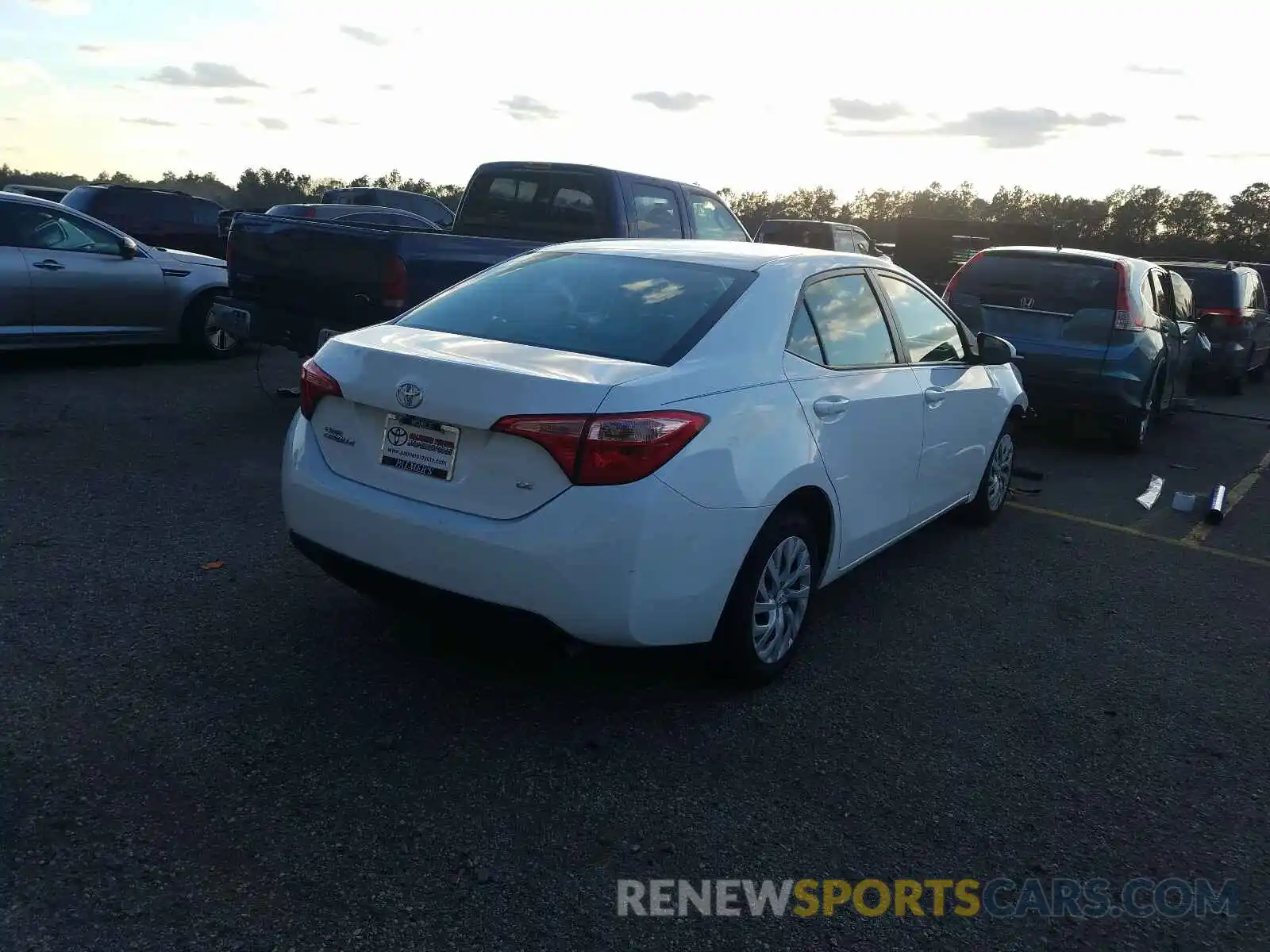 4 Photograph of a damaged car 5YFBURHE8KP874316 TOYOTA COROLLA 2019