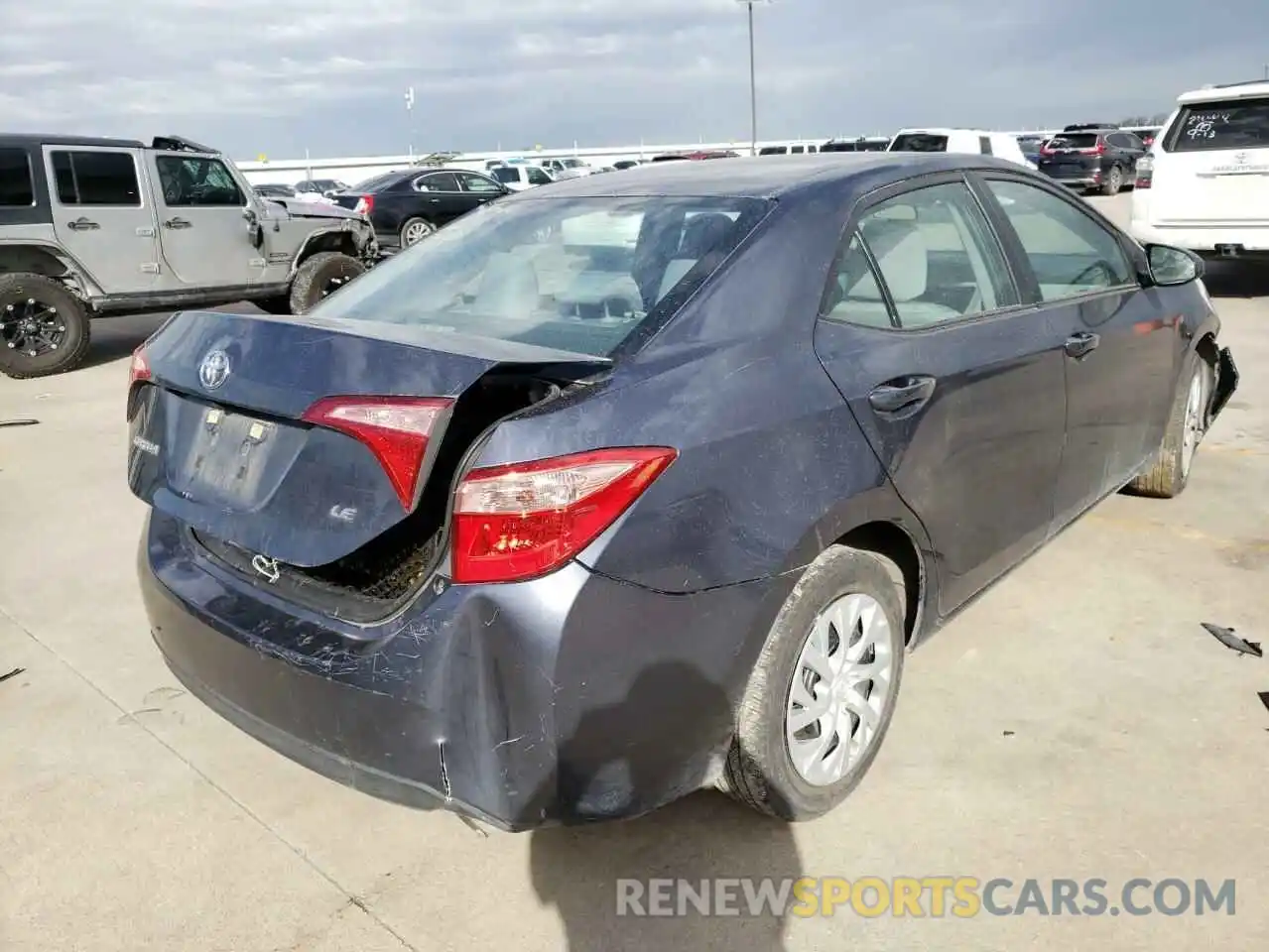 4 Photograph of a damaged car 5YFBURHE8KP876132 TOYOTA COROLLA 2019