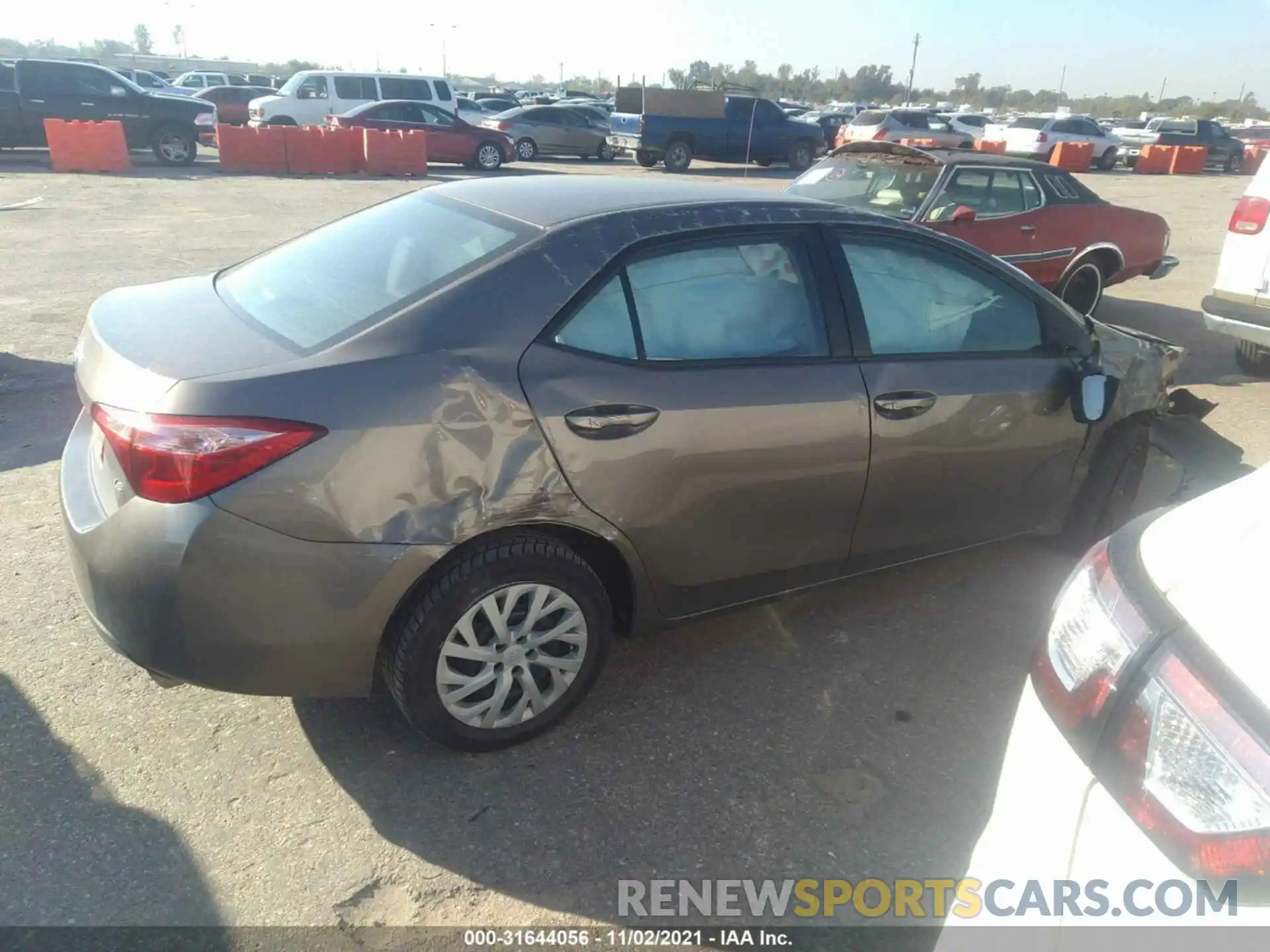 4 Photograph of a damaged car 5YFBURHE8KP878057 TOYOTA COROLLA 2019