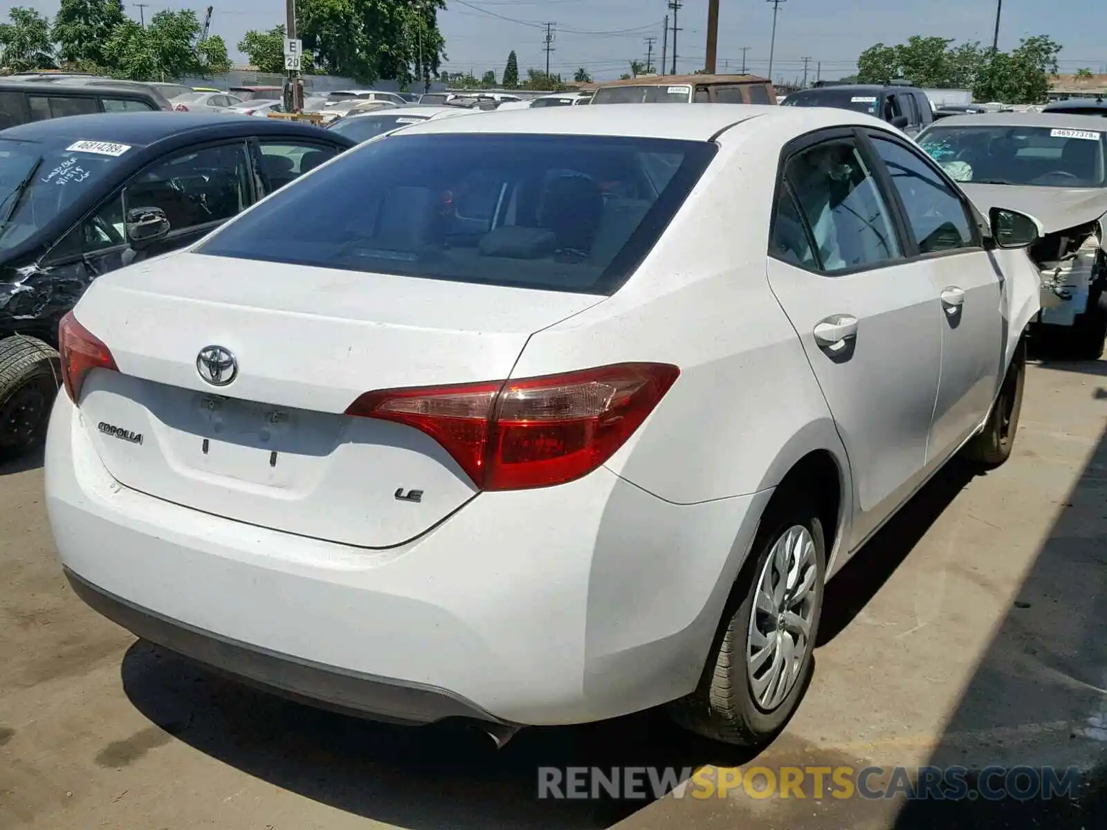 4 Photograph of a damaged car 5YFBURHE8KP886904 TOYOTA COROLLA 2019