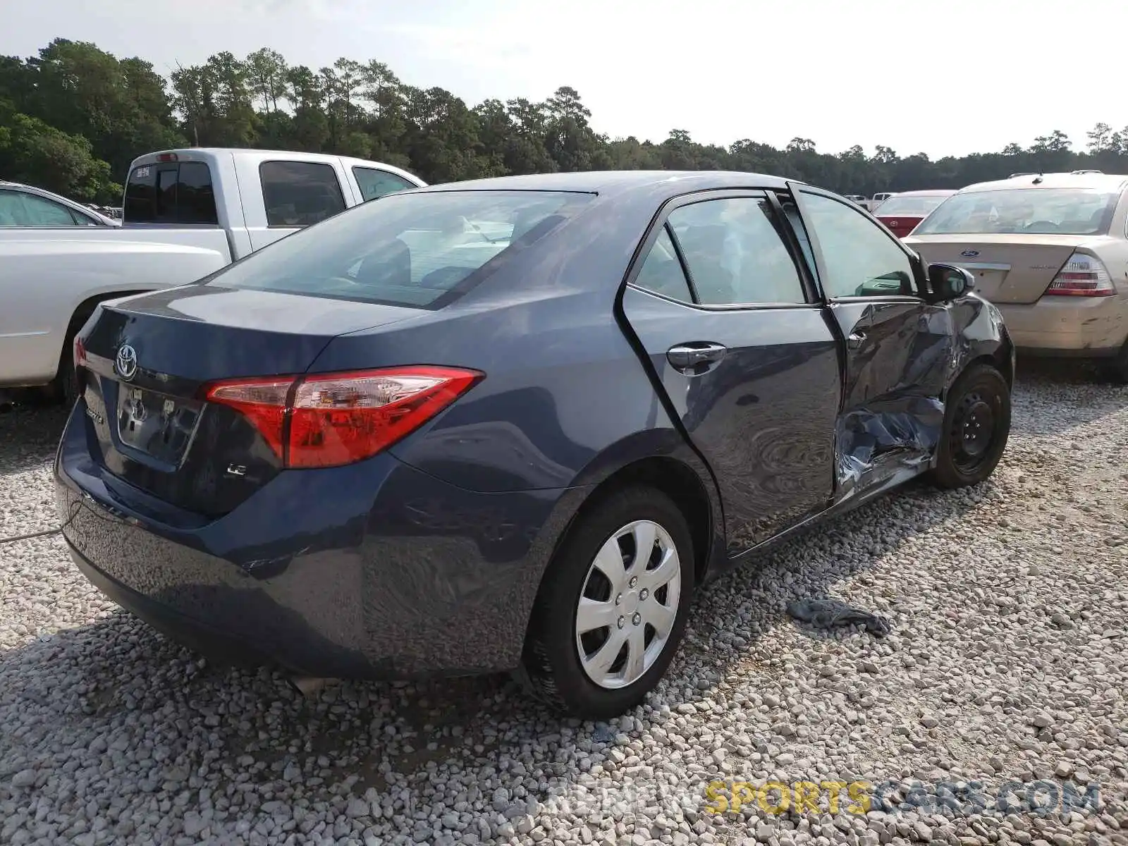 4 Photograph of a damaged car 5YFBURHE8KP891391 TOYOTA COROLLA 2019