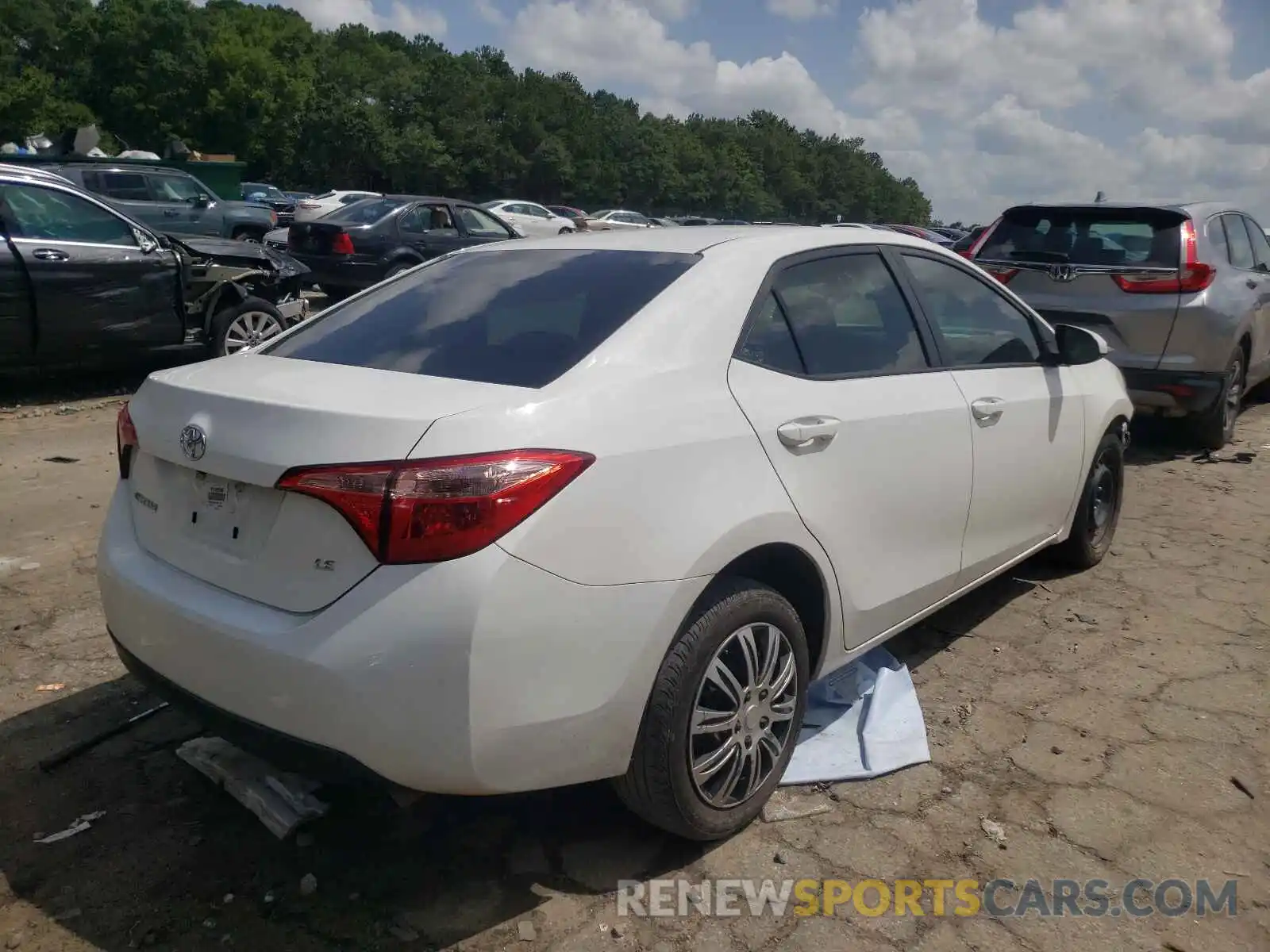 4 Photograph of a damaged car 5YFBURHE8KP931369 TOYOTA COROLLA 2019