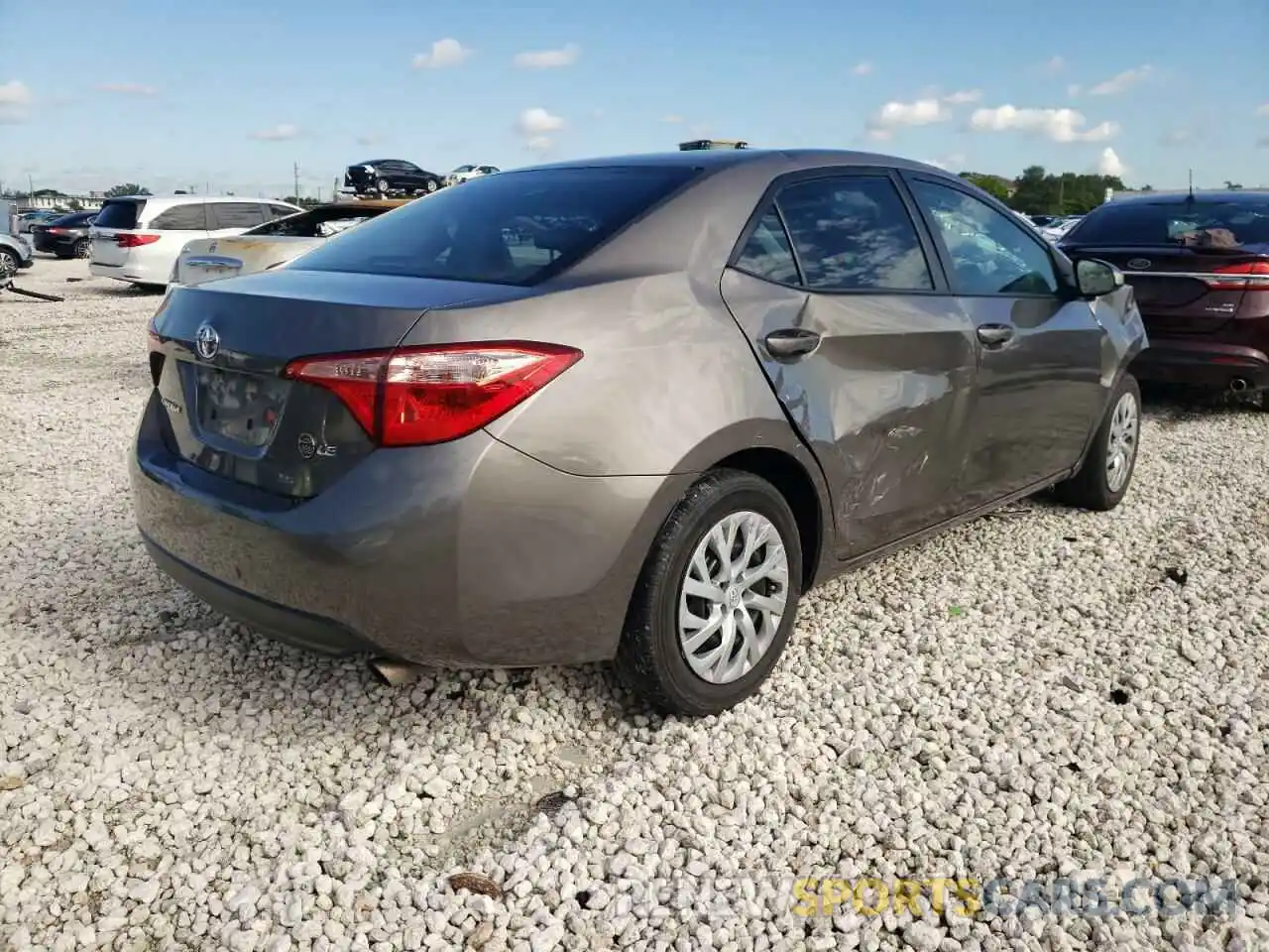 4 Photograph of a damaged car 5YFBURHE8KP938239 TOYOTA COROLLA 2019