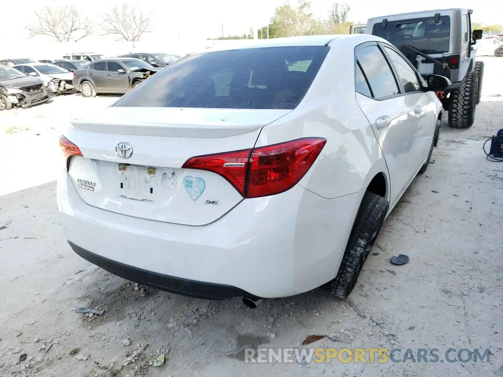 4 Photograph of a damaged car 5YFBURHE9KP857900 TOYOTA COROLLA 2019