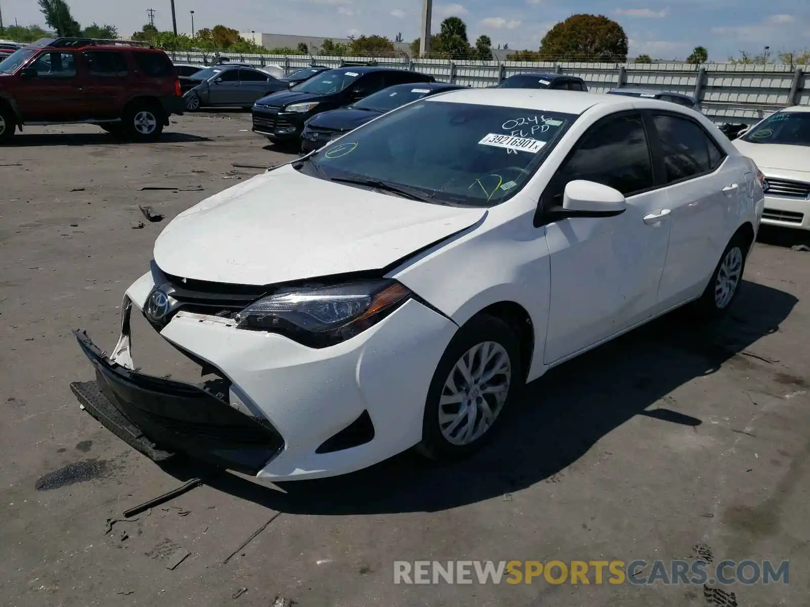 2 Photograph of a damaged car 5YFBURHE9KP860246 TOYOTA COROLLA 2019