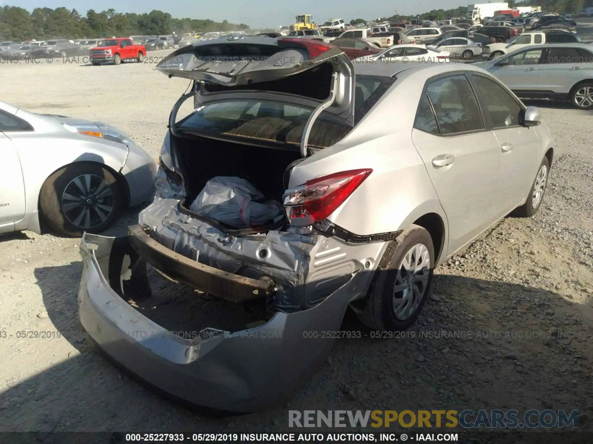 4 Photograph of a damaged car 5YFBURHE9KP861932 TOYOTA COROLLA 2019