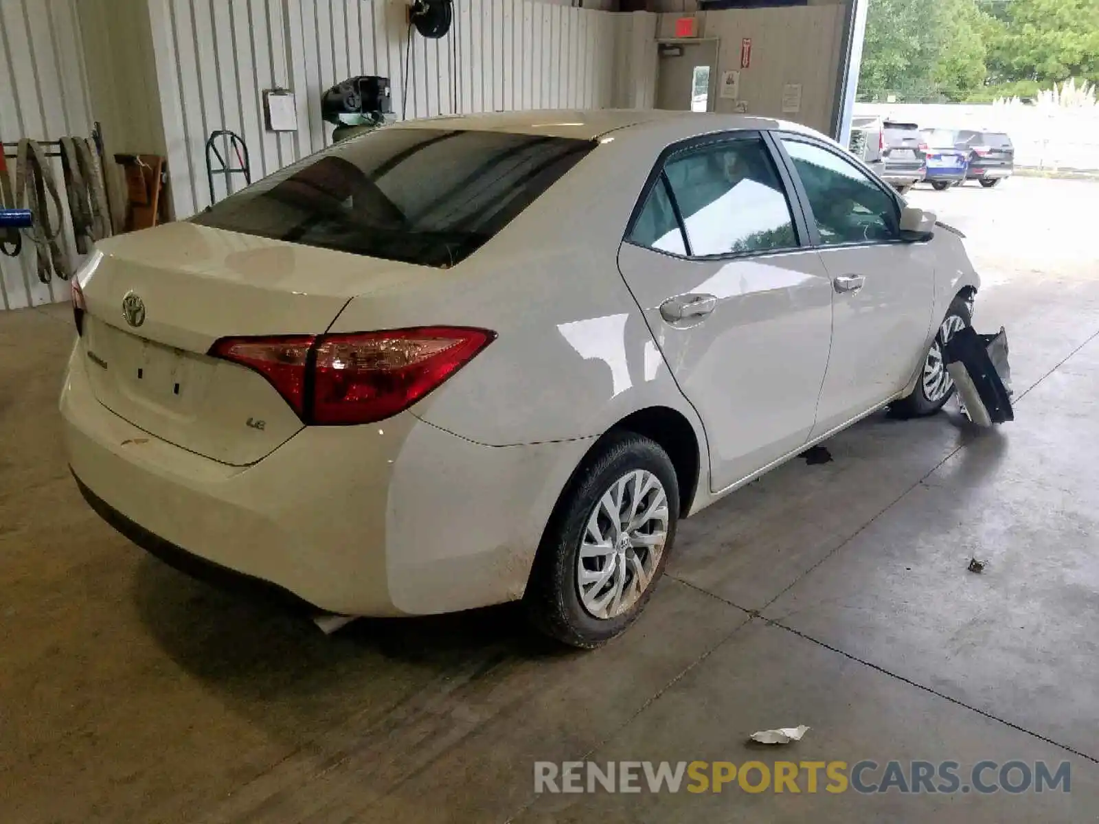 4 Photograph of a damaged car 5YFBURHE9KP863857 TOYOTA COROLLA 2019