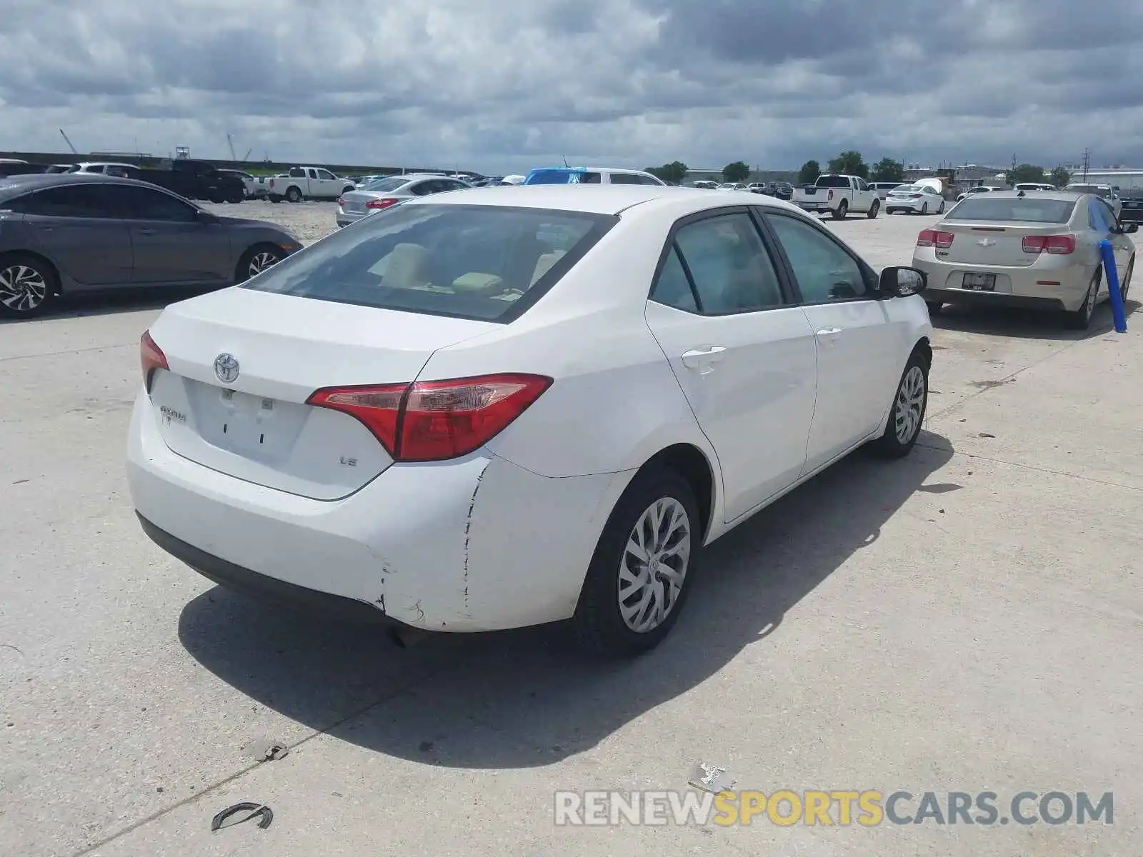 4 Photograph of a damaged car 5YFBURHE9KP864460 TOYOTA COROLLA 2019