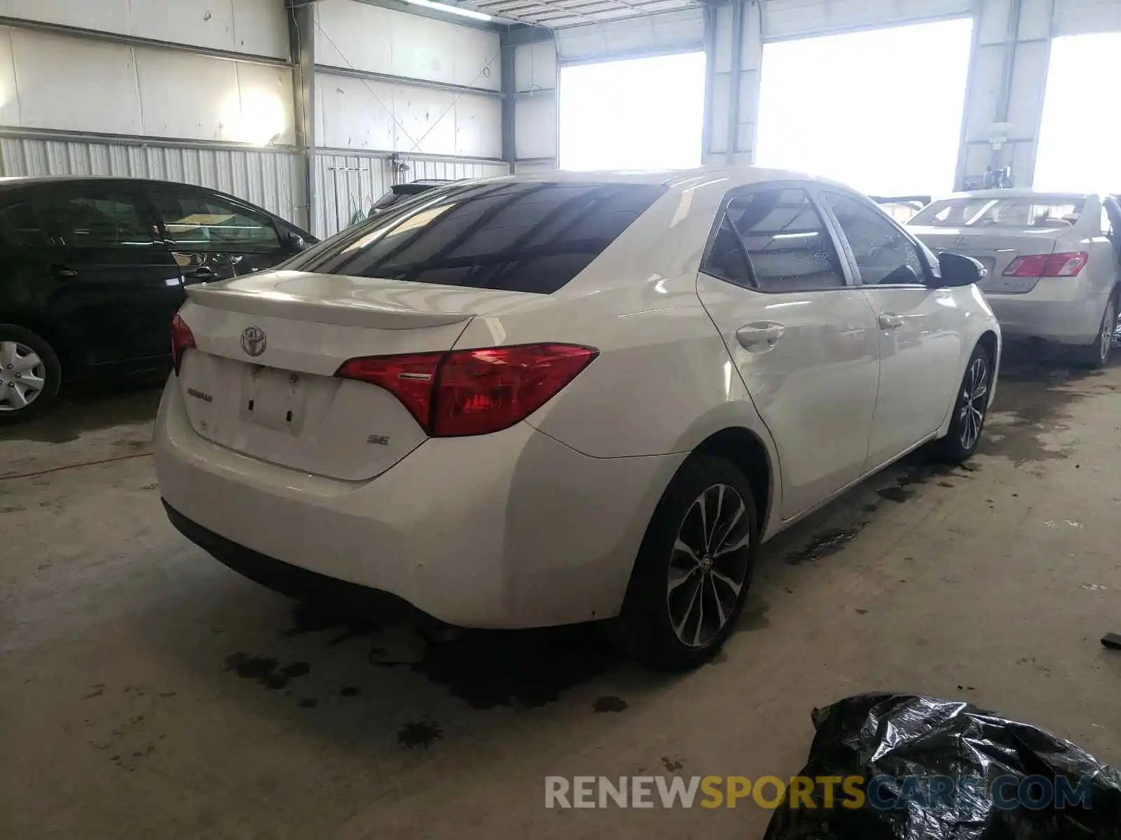 4 Photograph of a damaged car 5YFBURHE9KP870999 TOYOTA COROLLA 2019