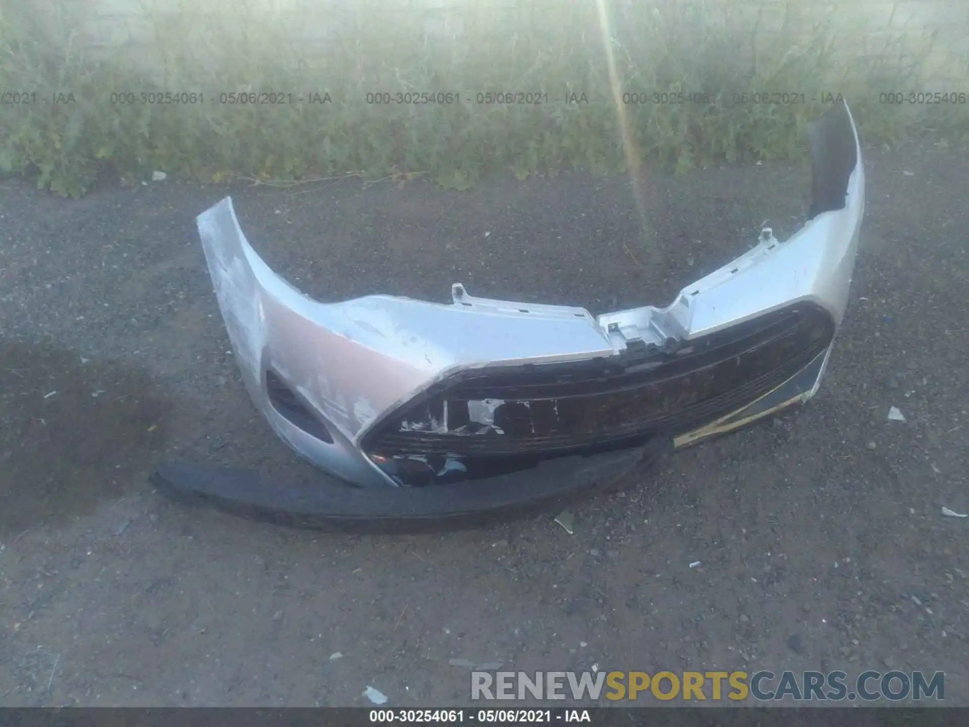 12 Photograph of a damaged car 5YFBURHE9KP871120 TOYOTA COROLLA 2019