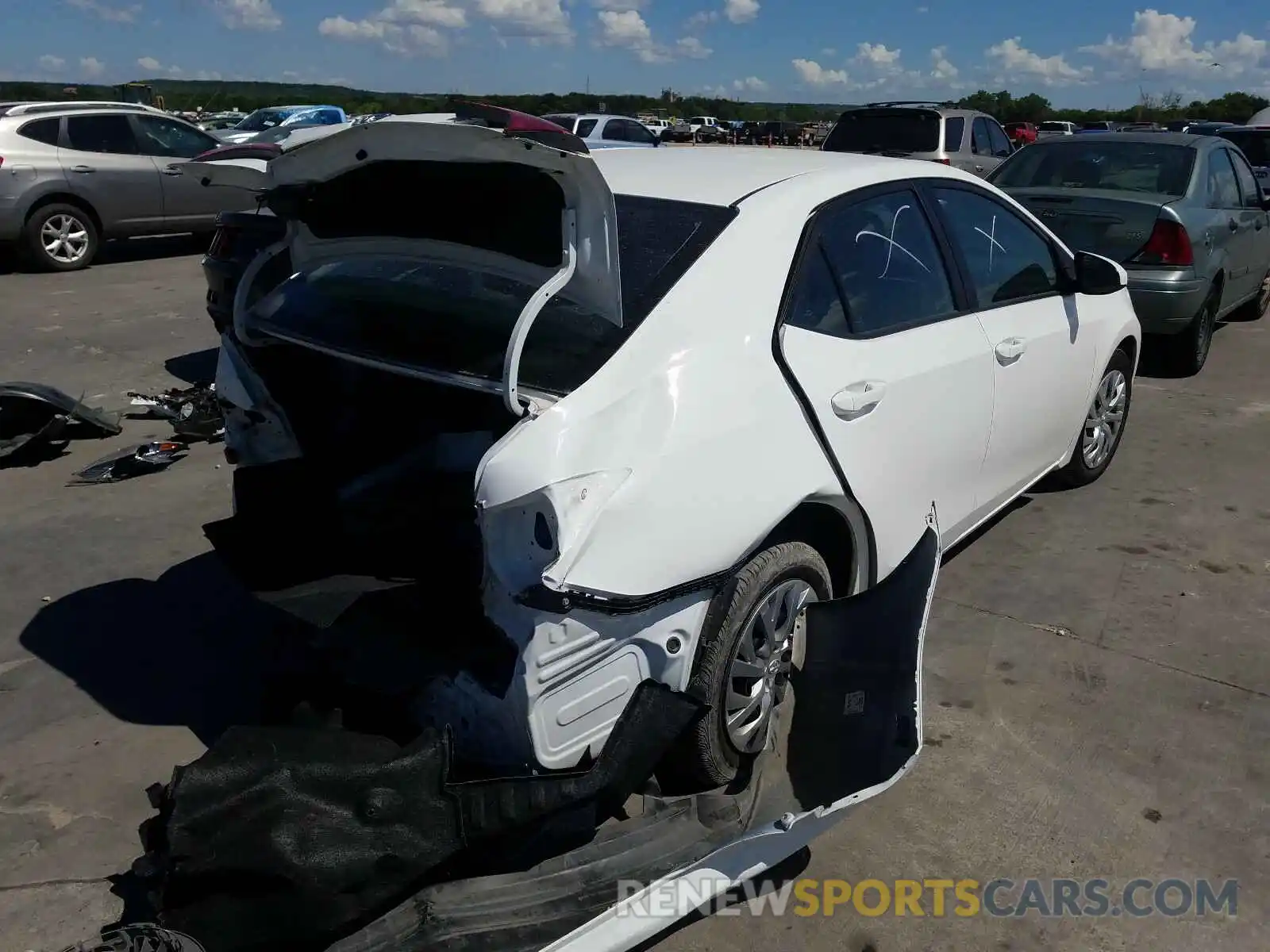 4 Photograph of a damaged car 5YFBURHE9KP871554 TOYOTA COROLLA 2019