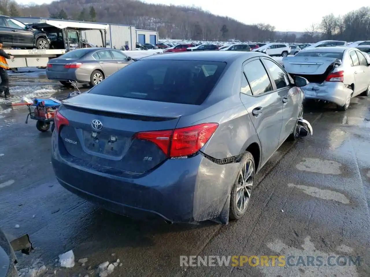 4 Photograph of a damaged car 5YFBURHE9KP875796 TOYOTA COROLLA 2019