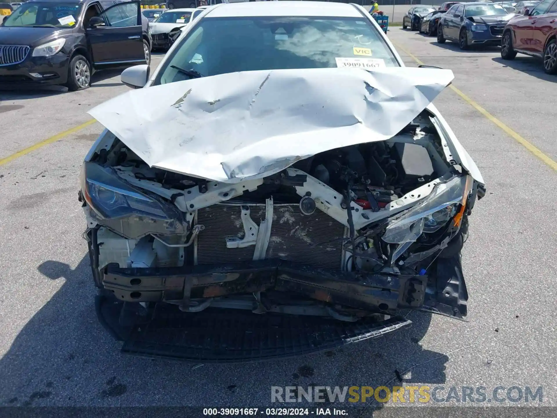 12 Photograph of a damaged car 5YFBURHE9KP878228 TOYOTA COROLLA 2019