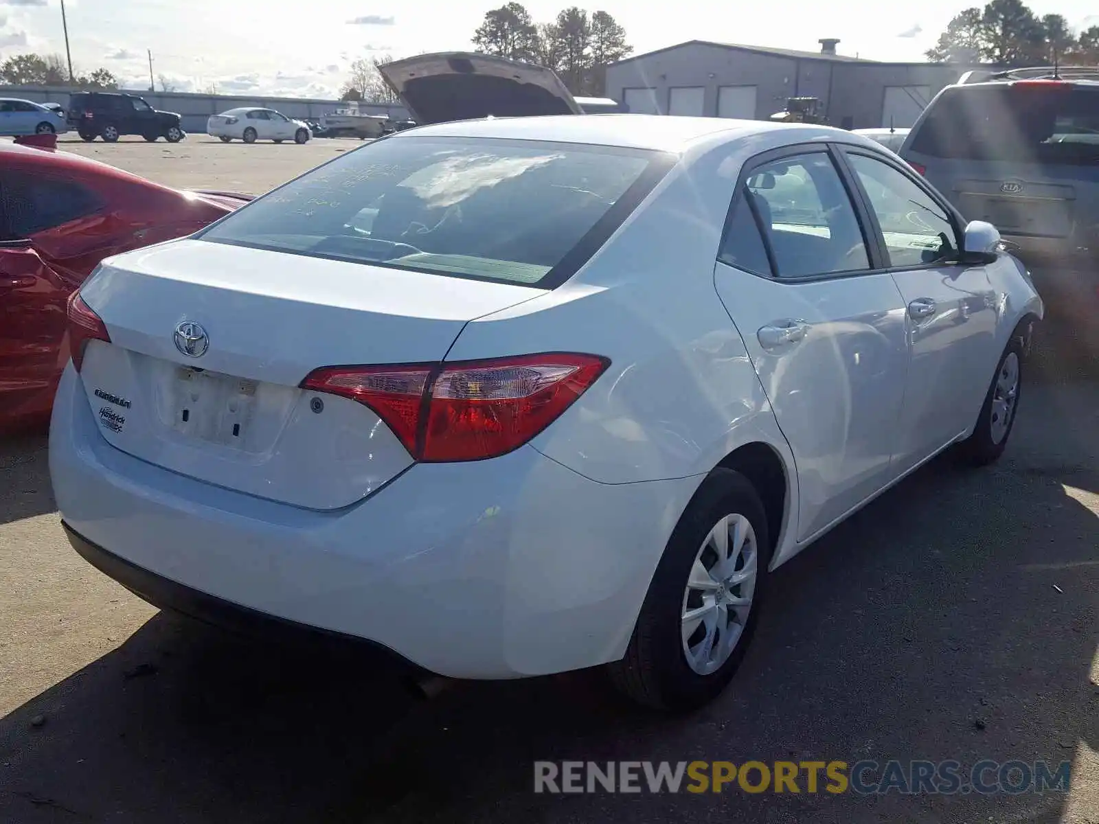 4 Photograph of a damaged car 5YFBURHE9KP882392 TOYOTA COROLLA 2019