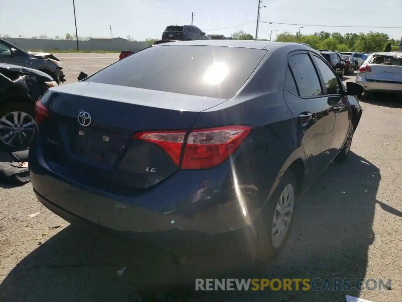 4 Photograph of a damaged car 5YFBURHE9KP906853 TOYOTA COROLLA 2019