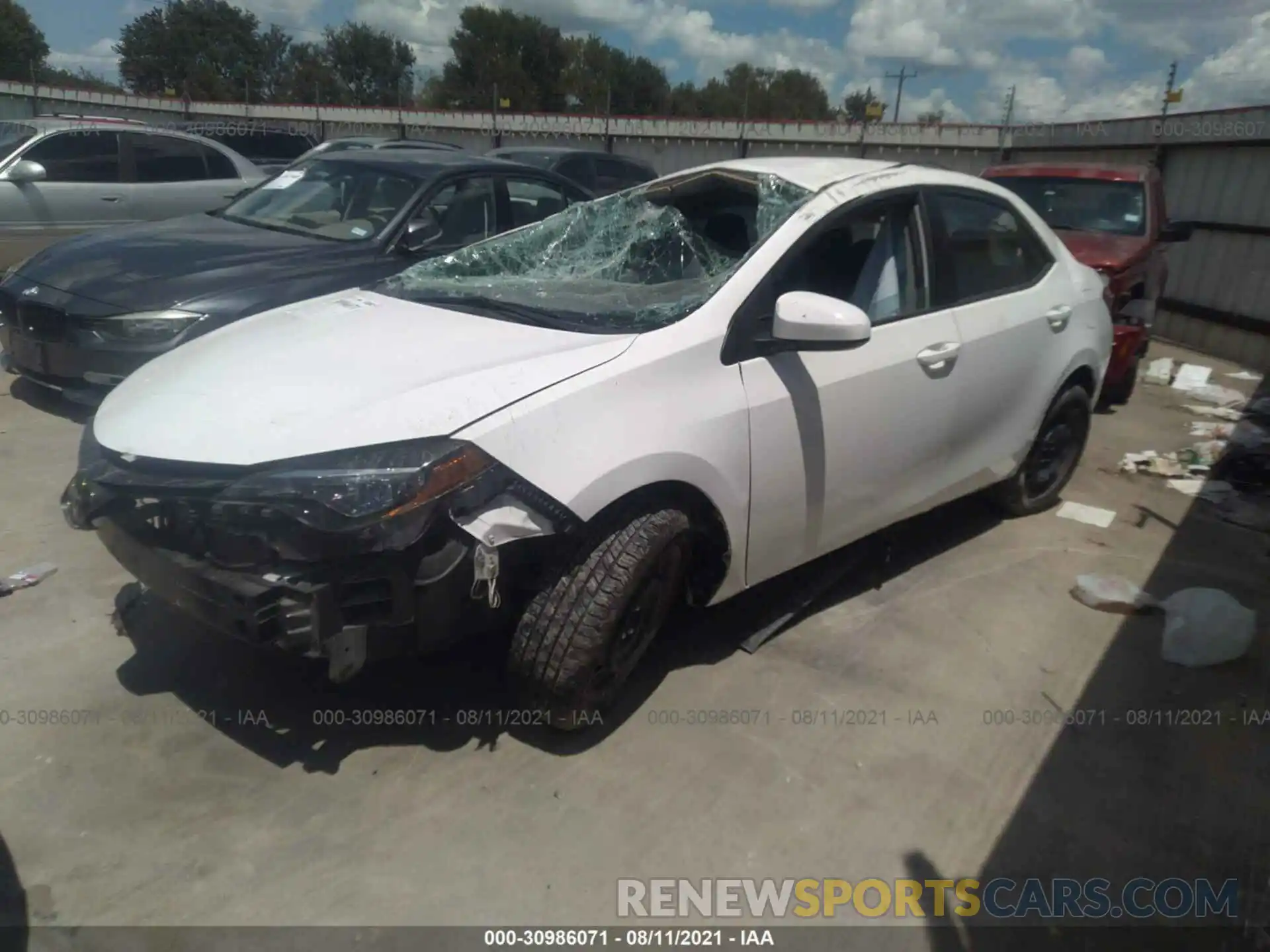 2 Photograph of a damaged car 5YFBURHE9KP931476 TOYOTA COROLLA 2019