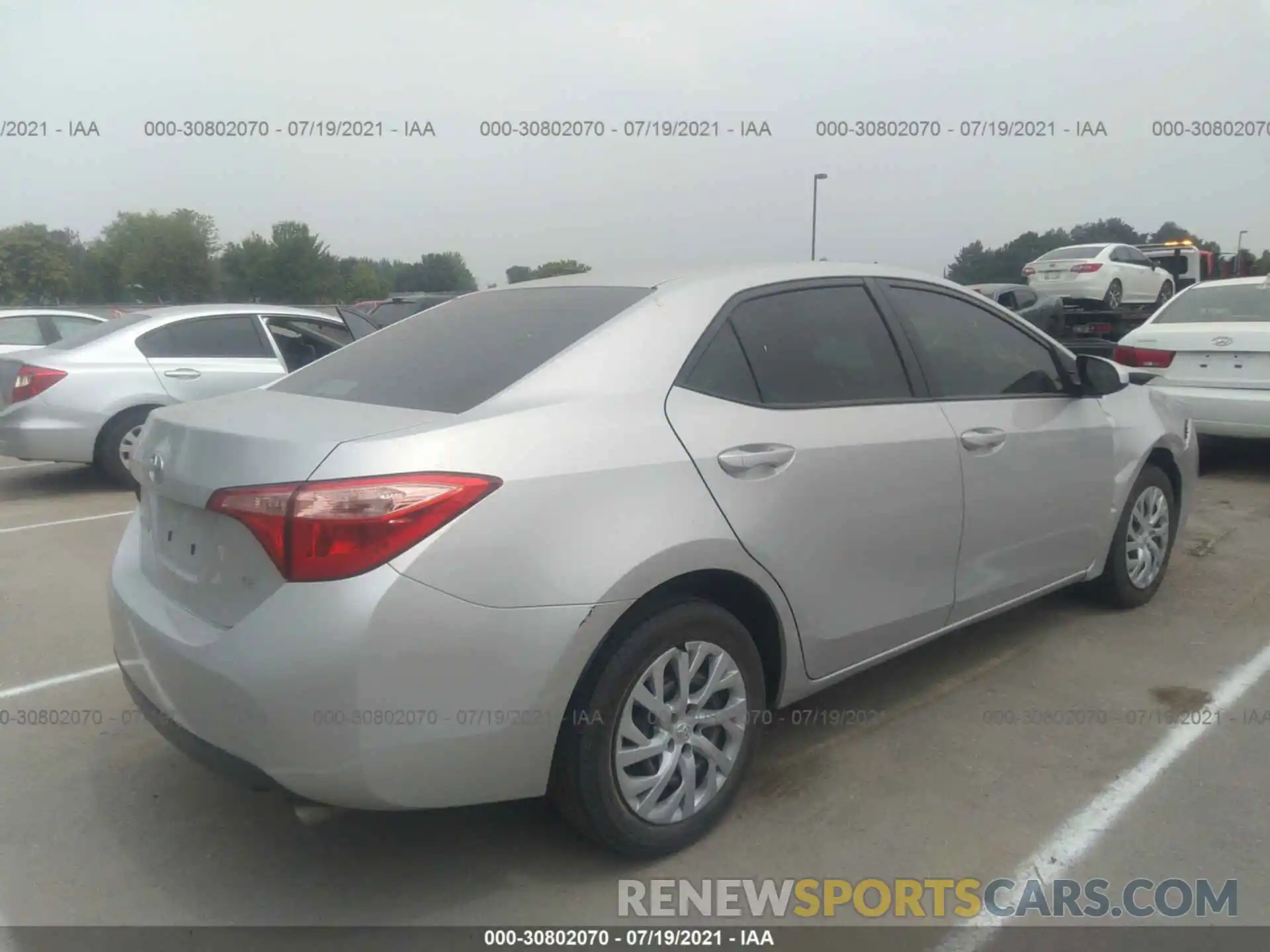 4 Photograph of a damaged car 5YFBURHE9KP942641 TOYOTA COROLLA 2019