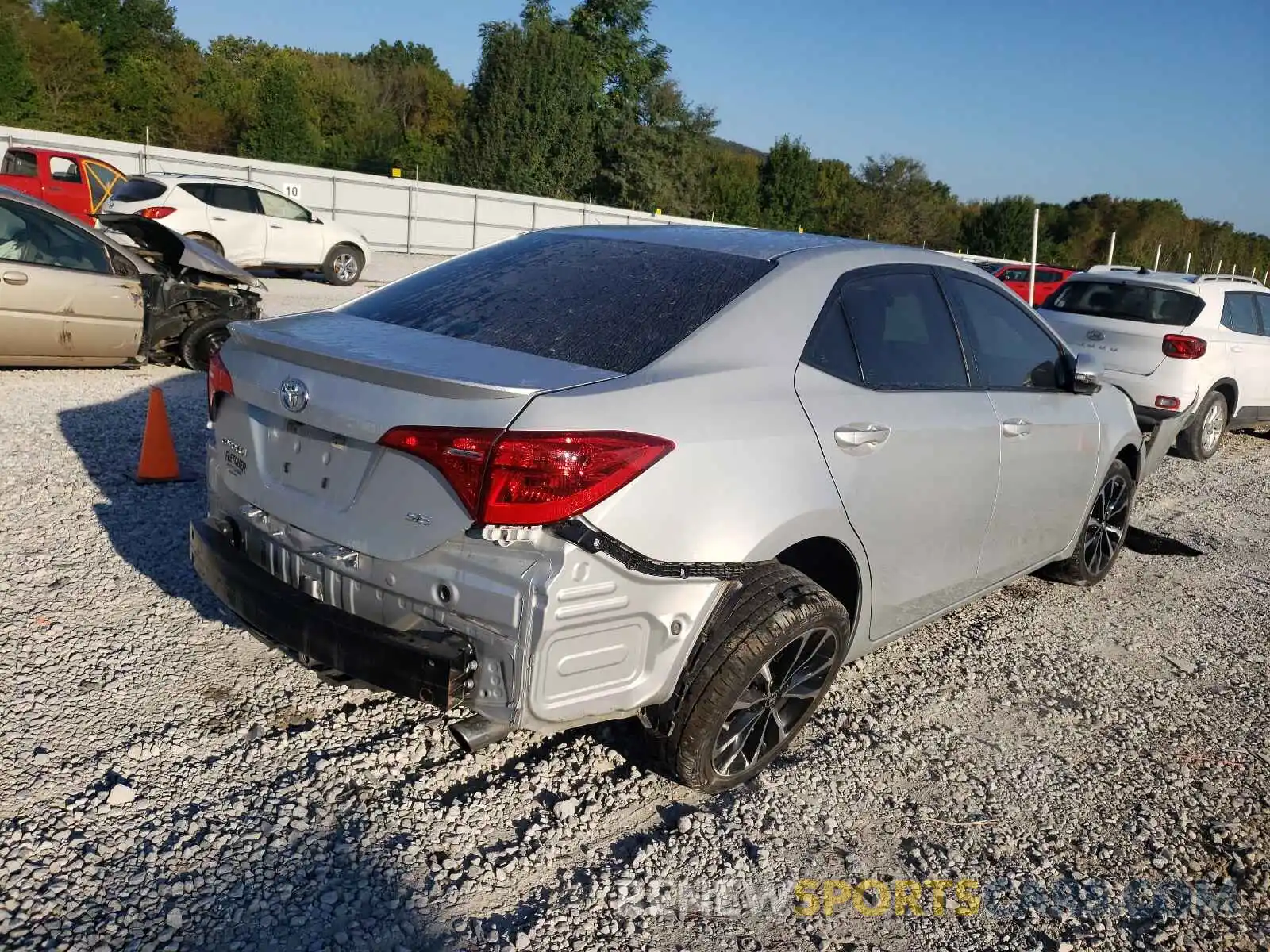 4 Photograph of a damaged car 5YFBURHE9KP948438 TOYOTA COROLLA 2019