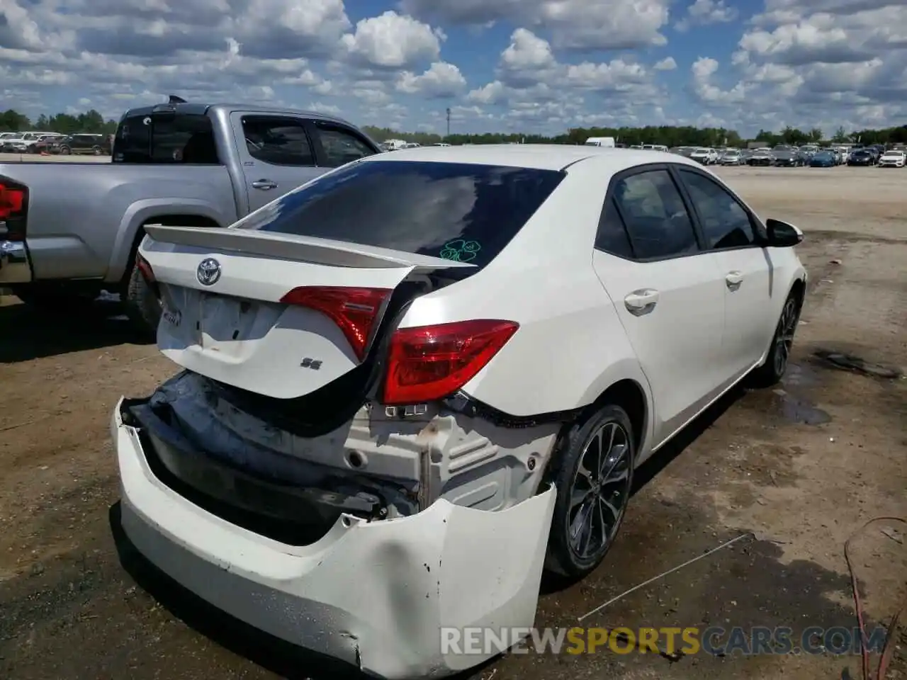 4 Photograph of a damaged car 5YFBURHEXKP857856 TOYOTA COROLLA 2019