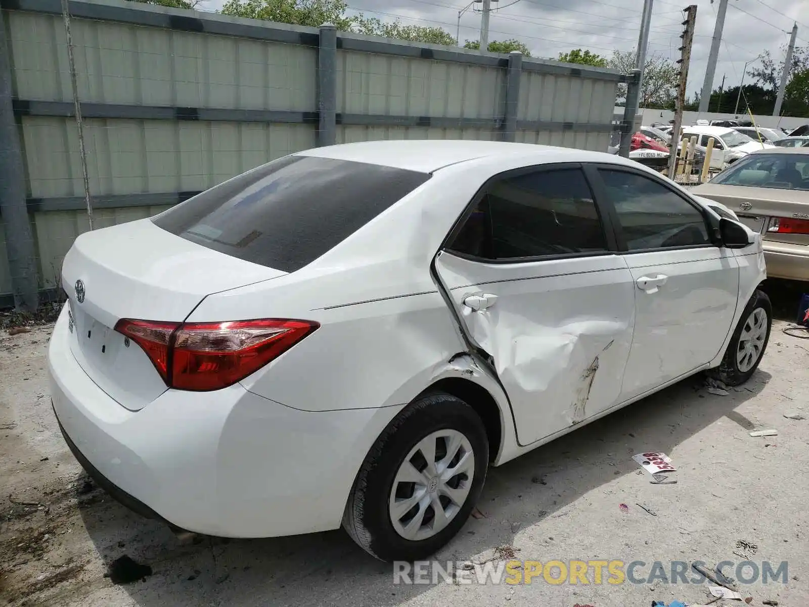 4 Photograph of a damaged car 5YFBURHEXKP858649 TOYOTA COROLLA 2019