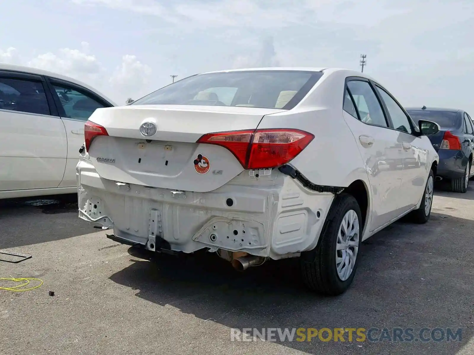 4 Photograph of a damaged car 5YFBURHEXKP860238 TOYOTA COROLLA 2019