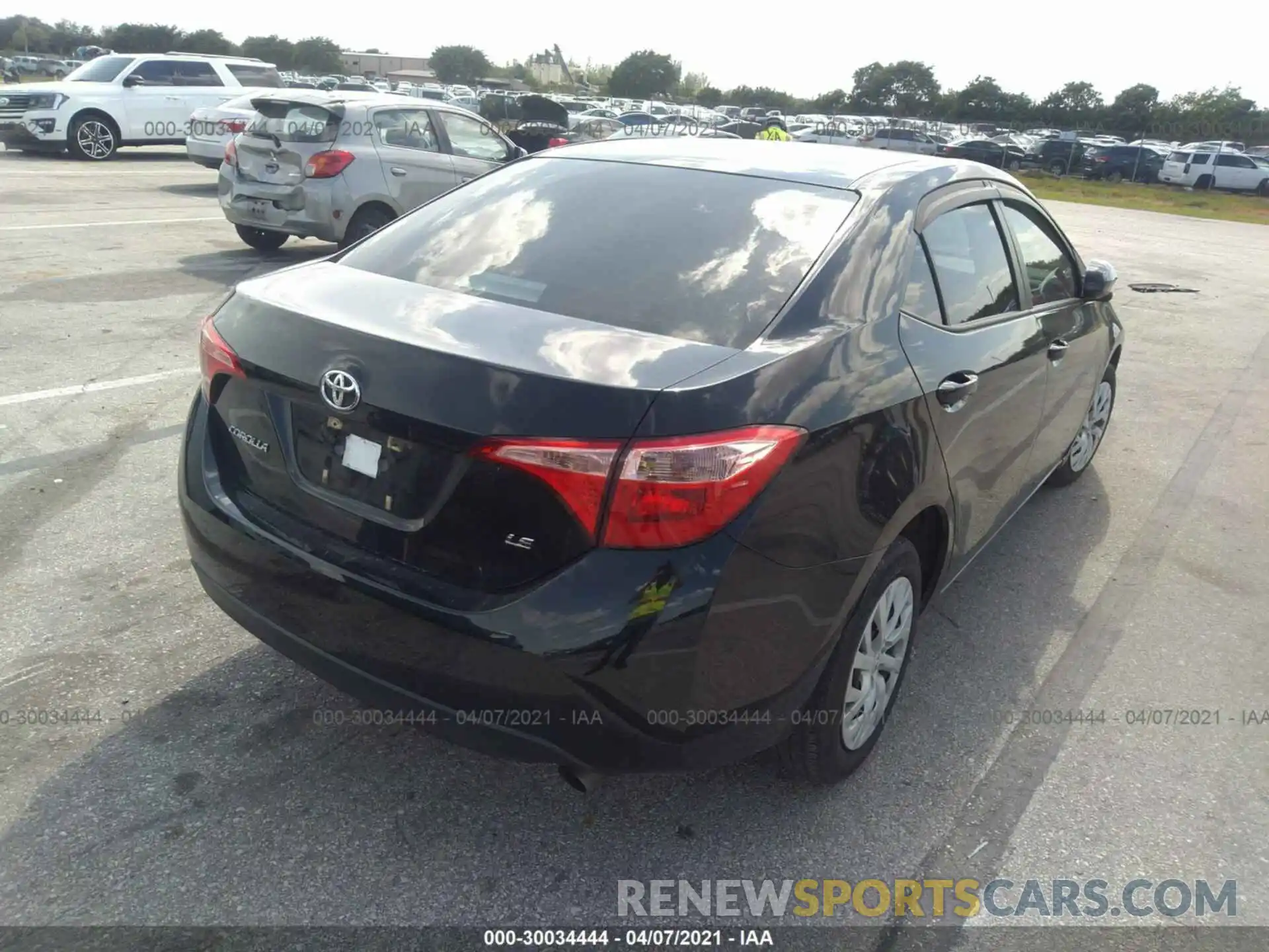 4 Photograph of a damaged car 5YFBURHEXKP864421 TOYOTA COROLLA 2019