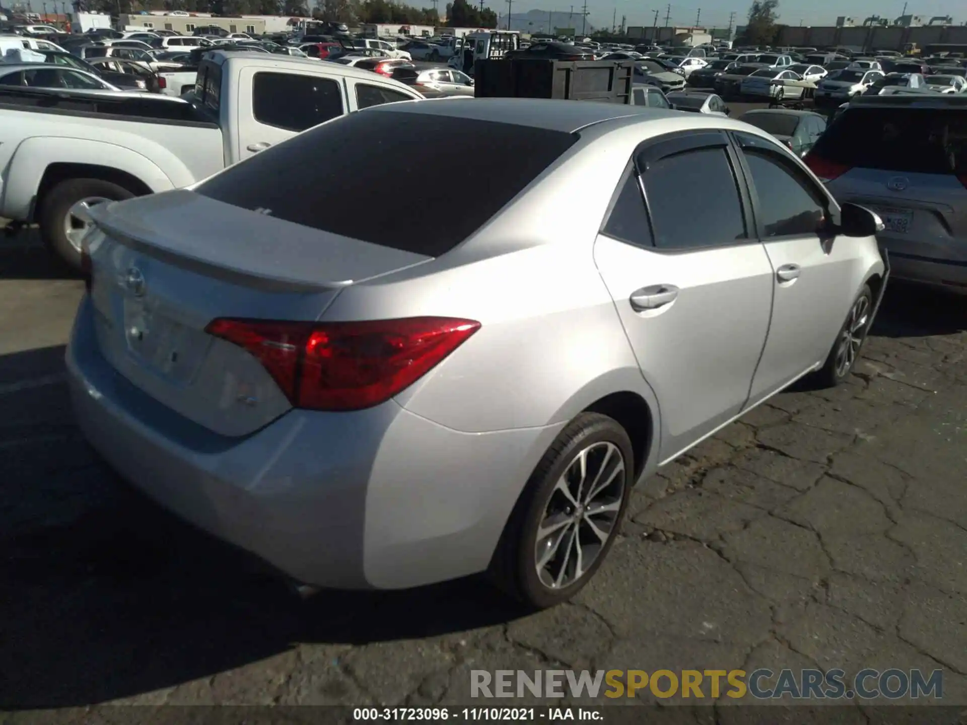 4 Photograph of a damaged car 5YFBURHEXKP865522 TOYOTA COROLLA 2019