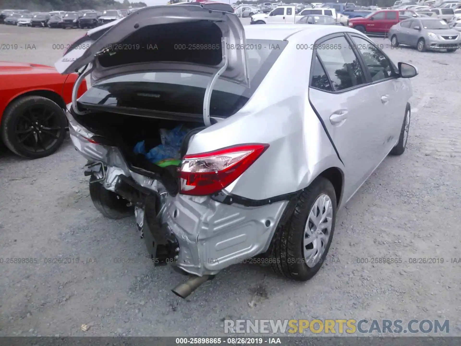 4 Photograph of a damaged car 5YFBURHEXKP870395 TOYOTA COROLLA 2019