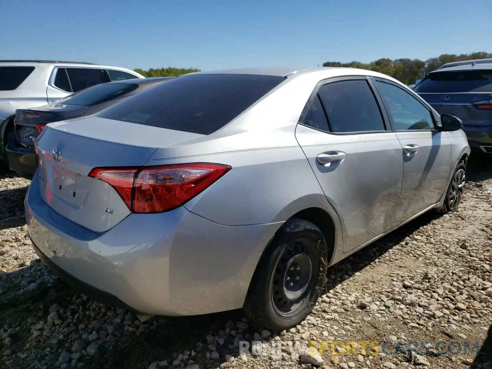 4 Photograph of a damaged car 5YFBURHEXKP878271 TOYOTA COROLLA 2019