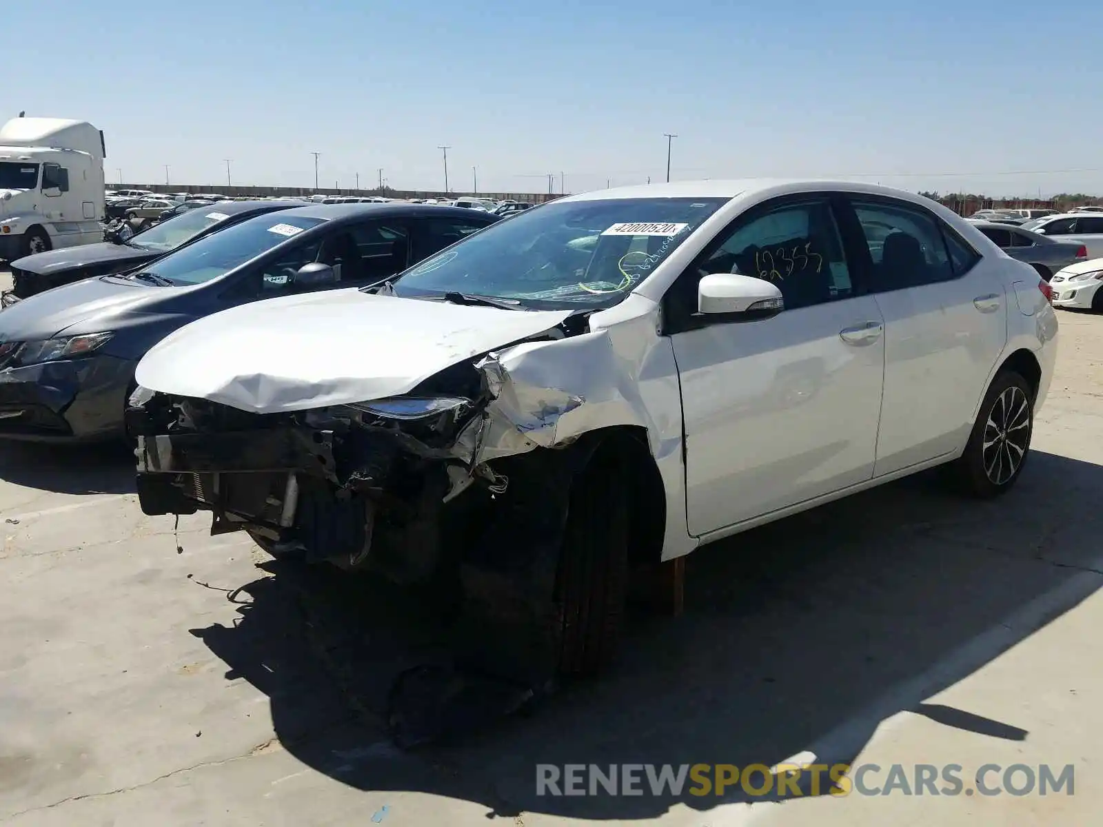 2 Photograph of a damaged car 5YFBURHEXKP880392 TOYOTA COROLLA 2019